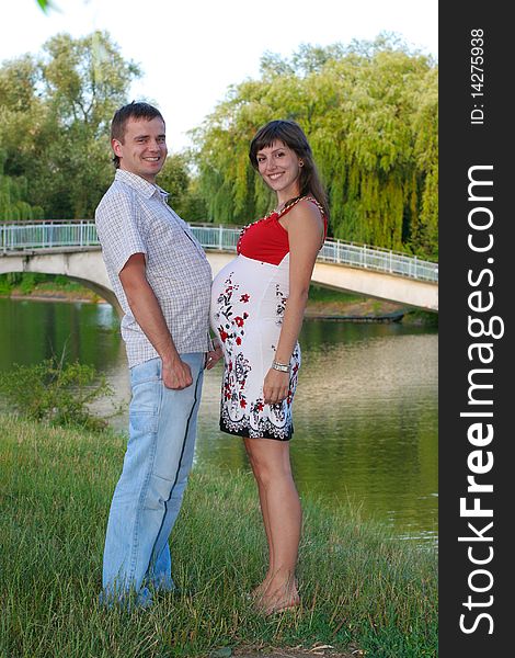 Happy pregnant woman with husband. Happy pregnant woman with husband