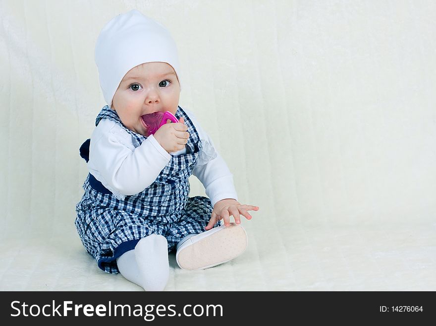 Happy child girl at studio