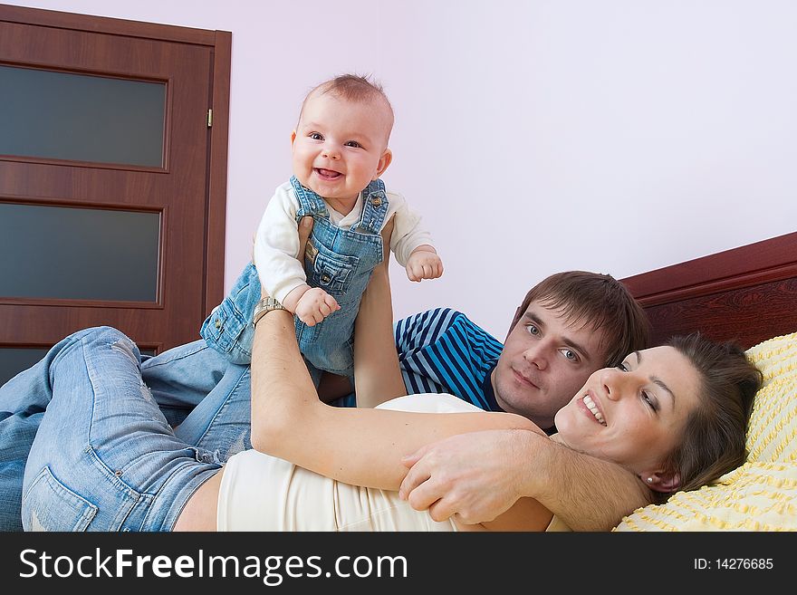 Family with infant  at home