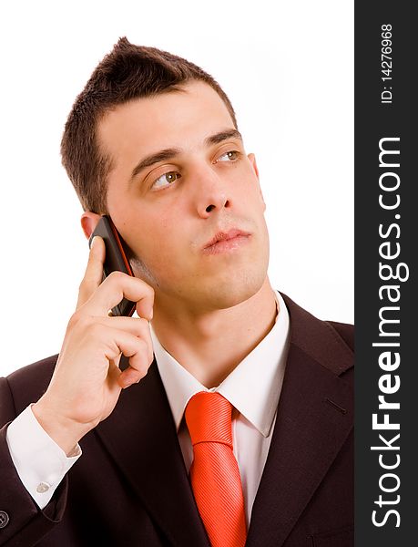 Young business man on the phone, isolated on white background