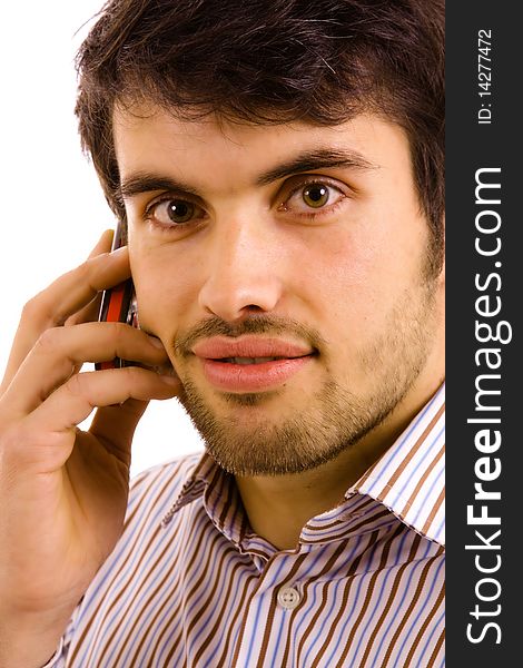 Close up portrait of young man on the phone, isolated on white