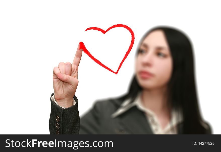 Young woman draws a heart shape on white background