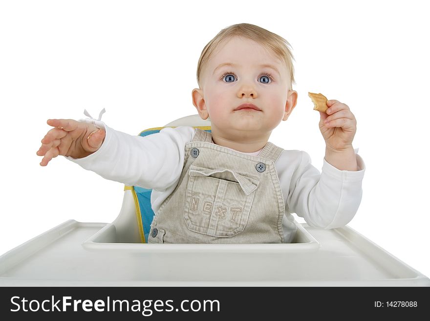 Infant biscuit on child's stool on egg white background. Infant biscuit on child's stool on egg white background.