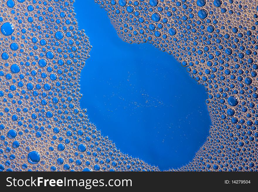 Mini bubble islands on blue
