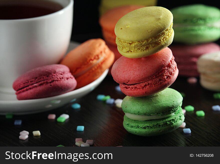 Macaroons different colors in dark light space. Macaroons different colors in dark light space