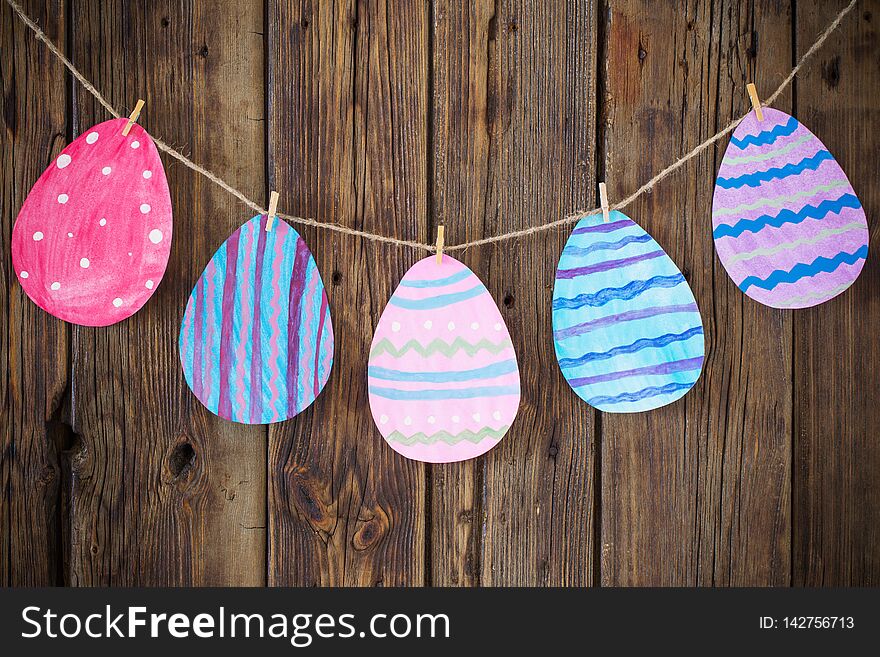Paper Easter painted eggs painted hang on clothespins