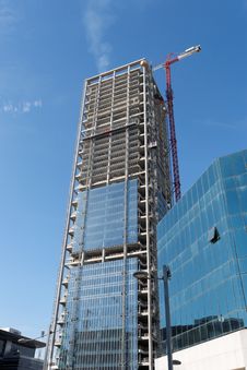 Lifting Crane At Skyscraper Construction Stock Photography