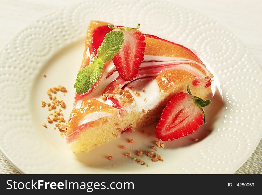 Sponge cake with curd and sweet fruit coulis. Sponge cake with curd and sweet fruit coulis