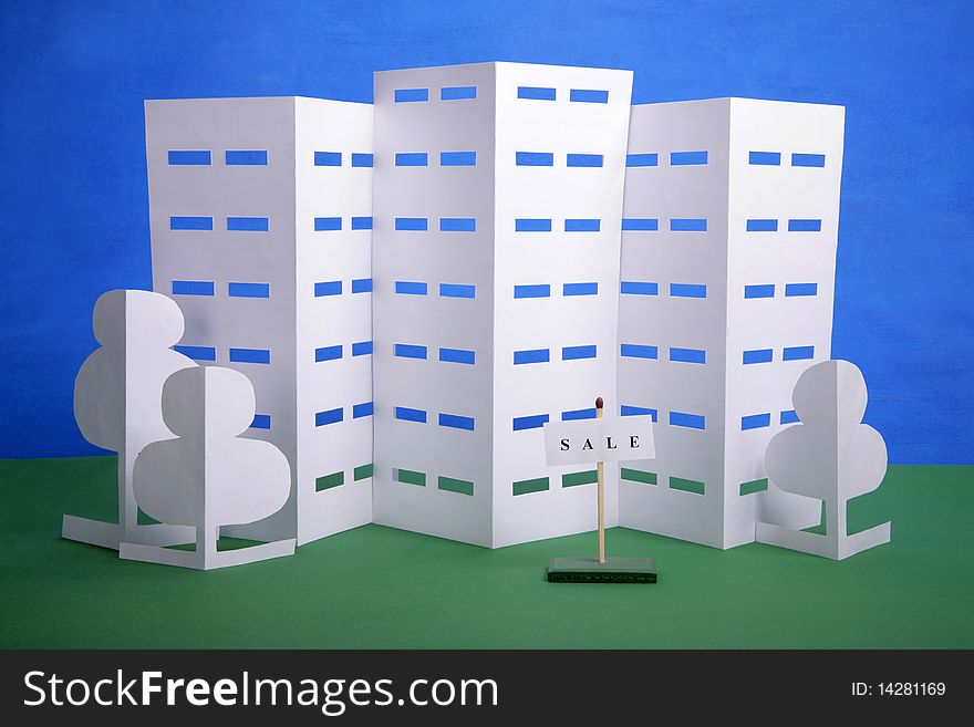Model of a modern building against the blue sky. Model of a modern building against the blue sky
