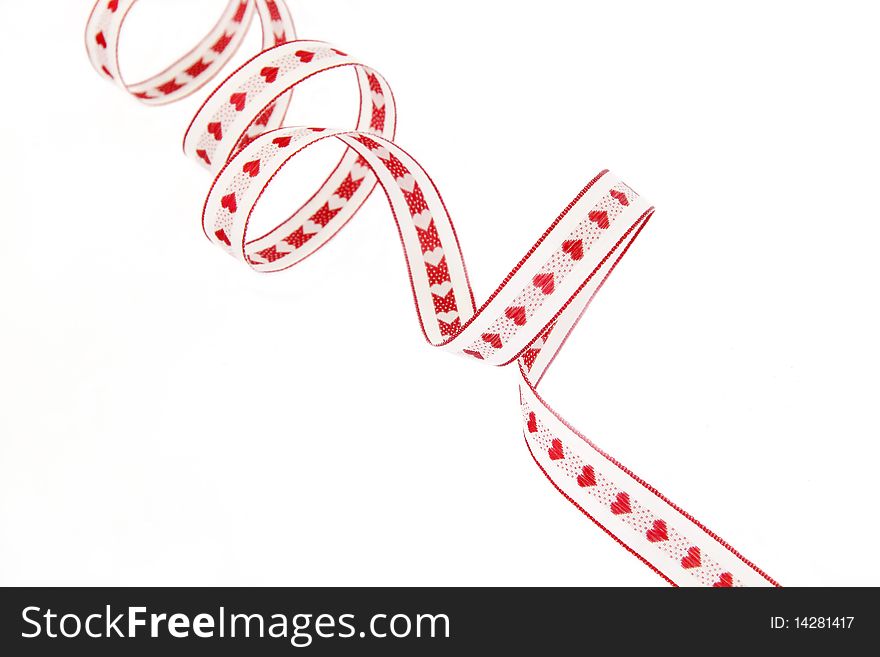 Ribbon with red hearts isolated on a white background