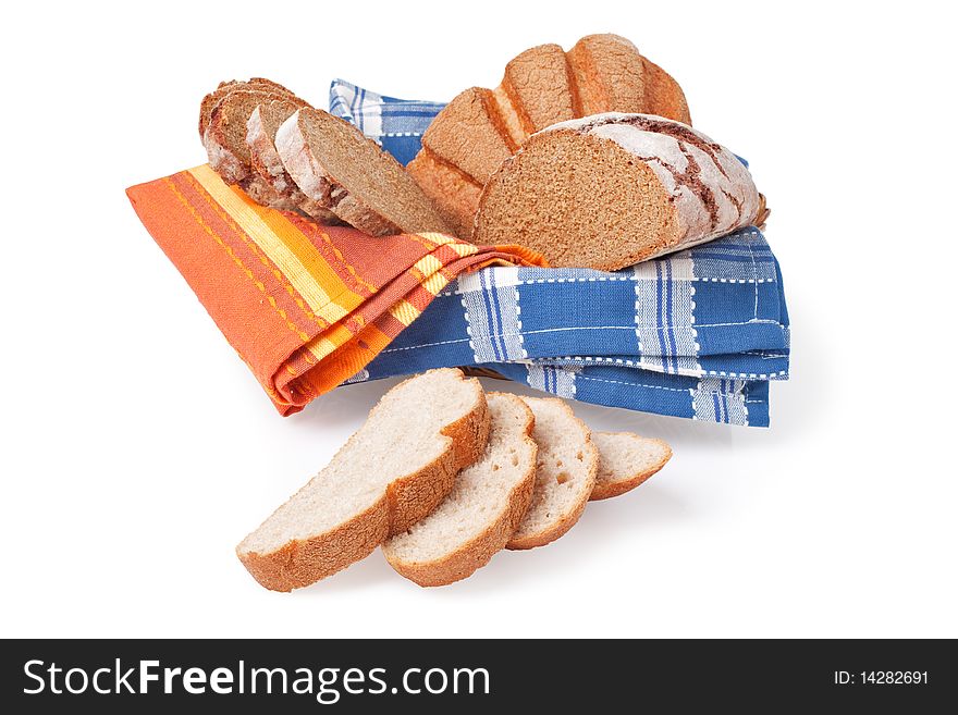 Sliced homemade brown bread, isolated on white