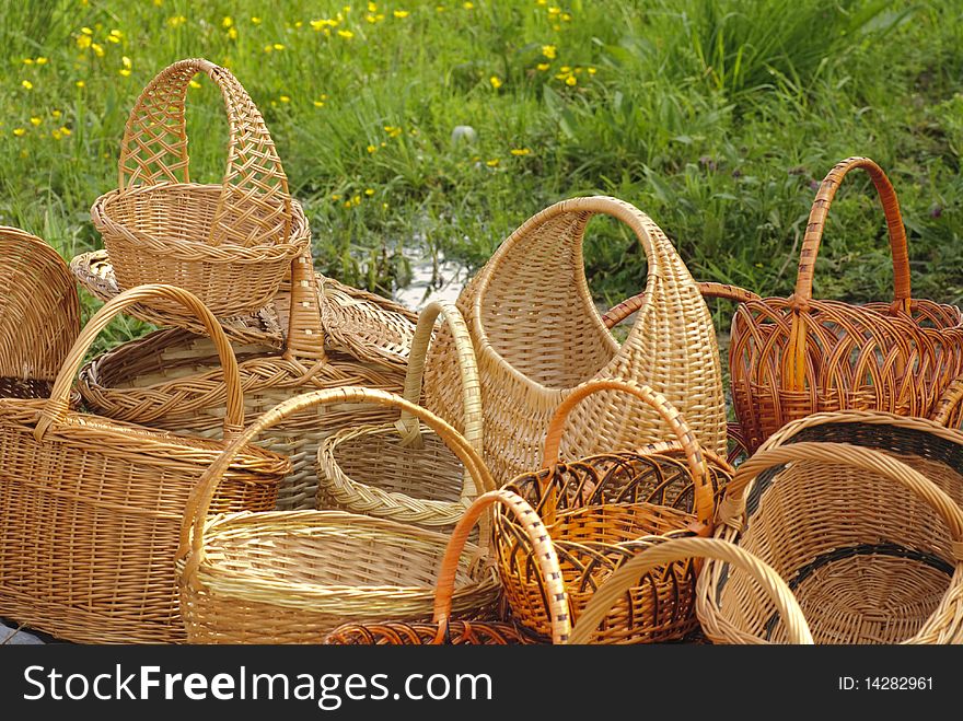 Basketry market on nature. Green field background. Basketry market on nature. Green field background.