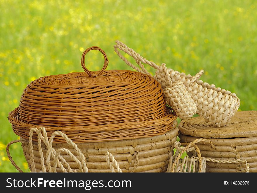 Basketry market on nature. Green field background. Basketry market on nature. Green field background.