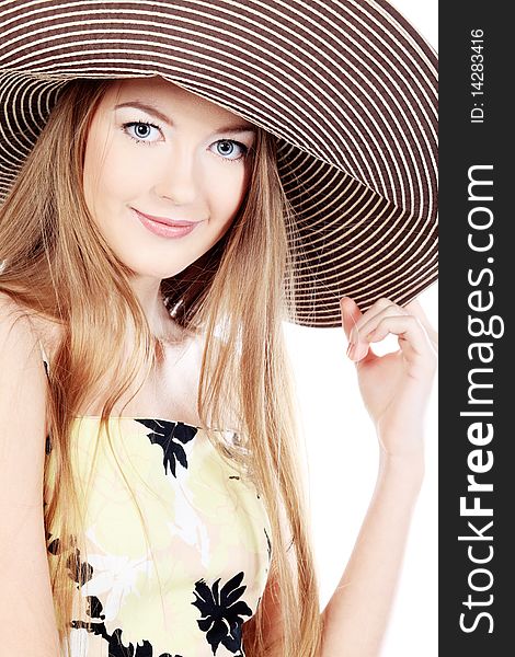 Portrait of a beautiful girl in a summer hat. Isolated over white background. Portrait of a beautiful girl in a summer hat. Isolated over white background.