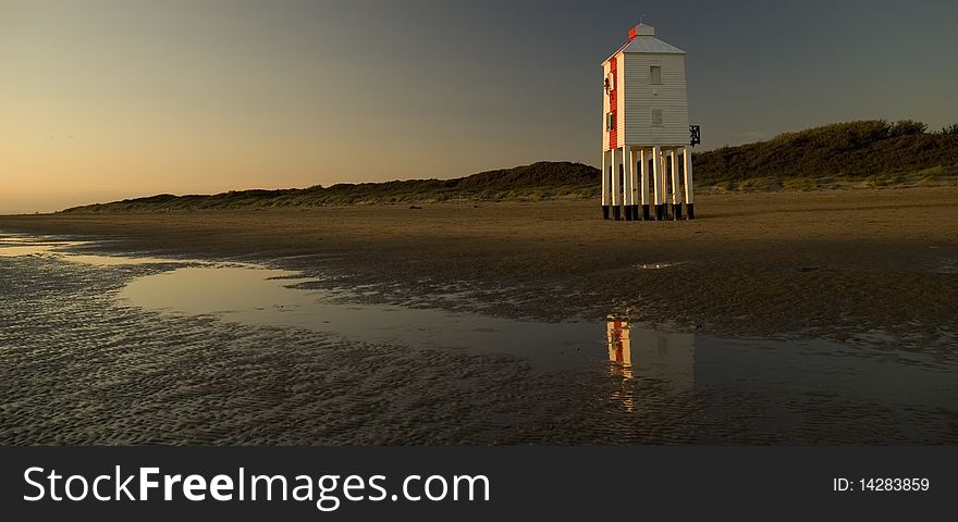 Beach Scene With Lighthouse