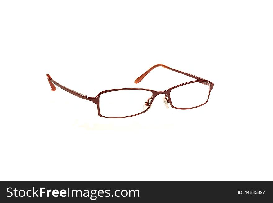 Pair of red spectacles isolated on a white background