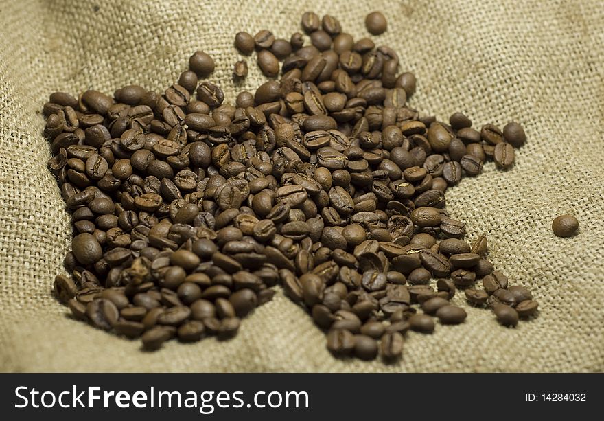 Close up of coffee beans on linen background
