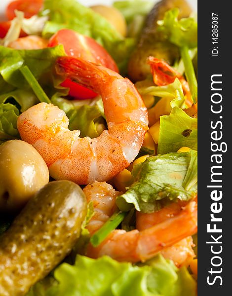 Photo of colorful salad with shrimps, mais and lettuce. Photo of colorful salad with shrimps, mais and lettuce