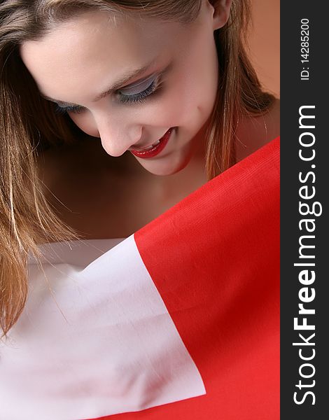 Young blond model covered by the English Flag. Young blond model covered by the English Flag