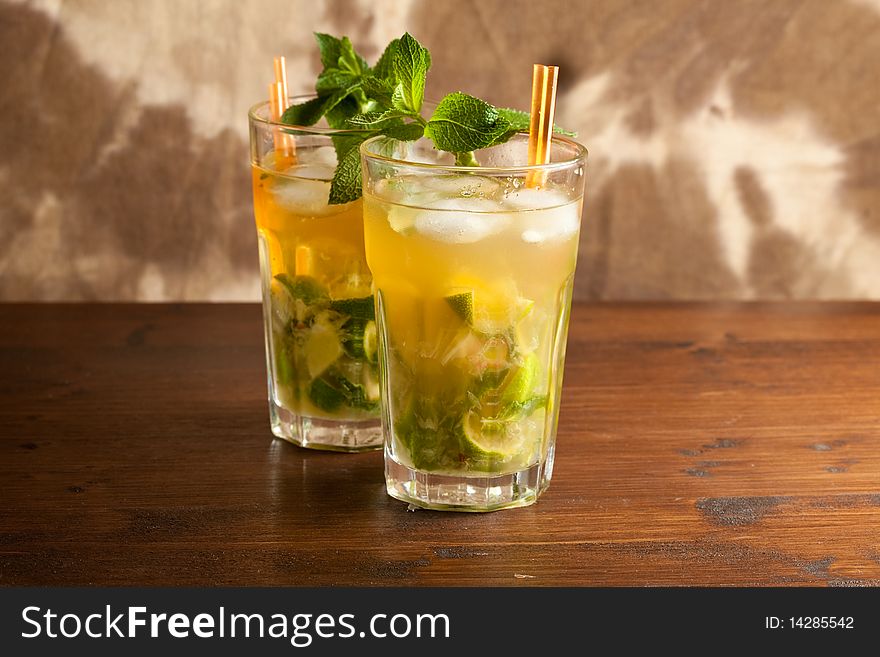 Photo of cuban mojito cocktail with brown sugar and mint