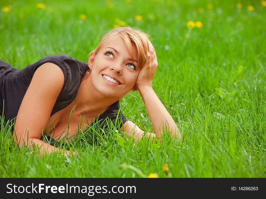 Young Pretty Girl On Grass