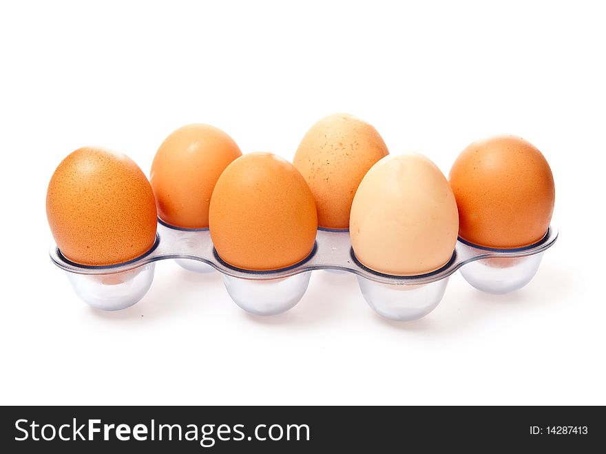 Row from eggs isolated on white background