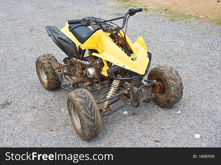 An old ATV car in a farm.