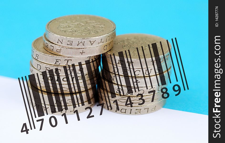UK pound coins overlaid with barcode. UK pound coins overlaid with barcode