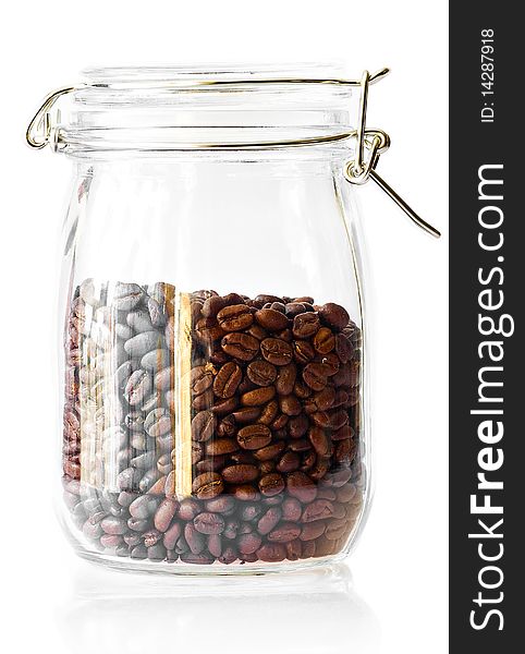 Coffee beans in a cristal jar on a white background