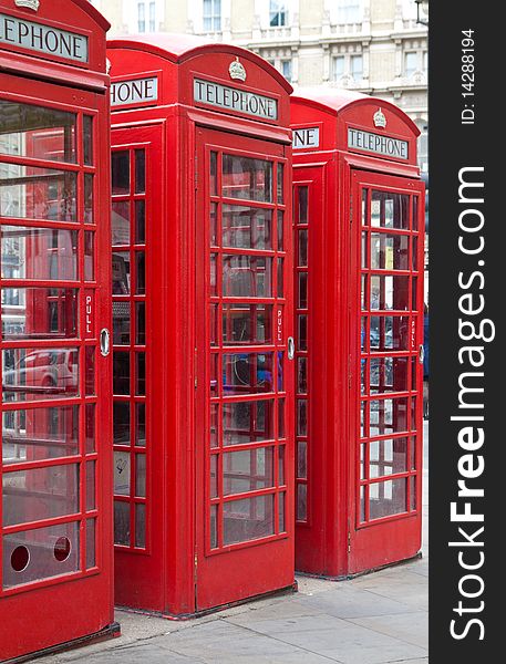 A group of typical red London phone cabins. A group of typical red London phone cabins