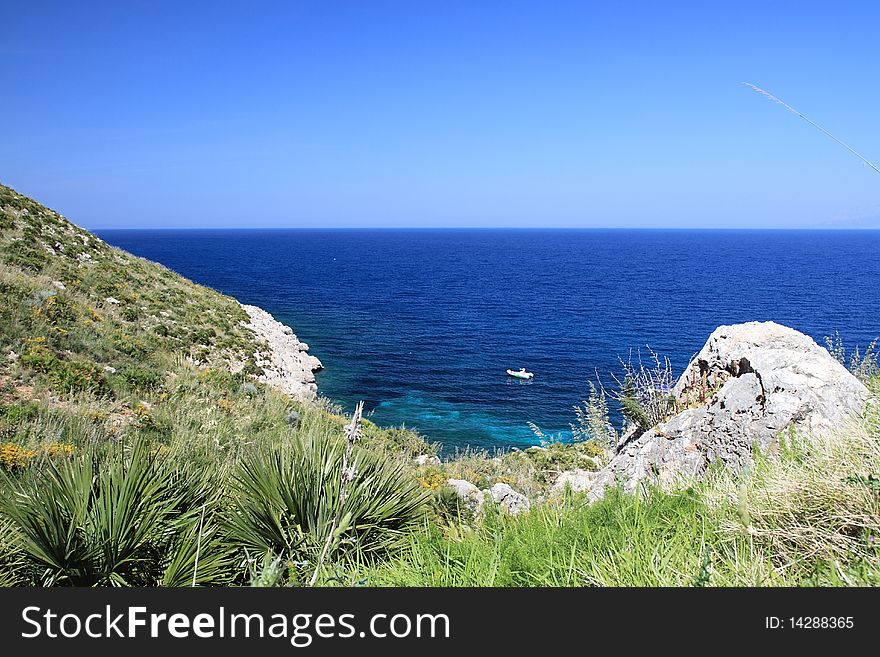 A glimpse of the rock and the blue sea in the natural reserve of Zingaro Sicily Italy. A glimpse of the rock and the blue sea in the natural reserve of Zingaro Sicily Italy