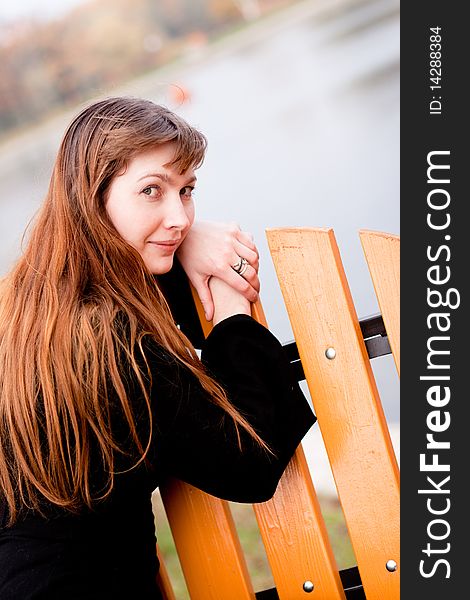 Portrait of  lady in black dress in the park