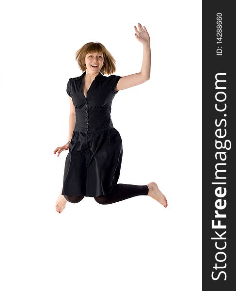 Happy woman dancing in studio