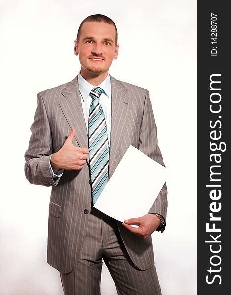 Young businessman with document. You can just add your text there. Young businessman with document. You can just add your text there