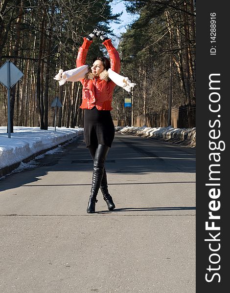 Happy woman walking outdoor in park