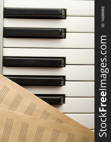 Piano Keyboard which is the old pure musical sheets. Piano Keyboard which is the old pure musical sheets