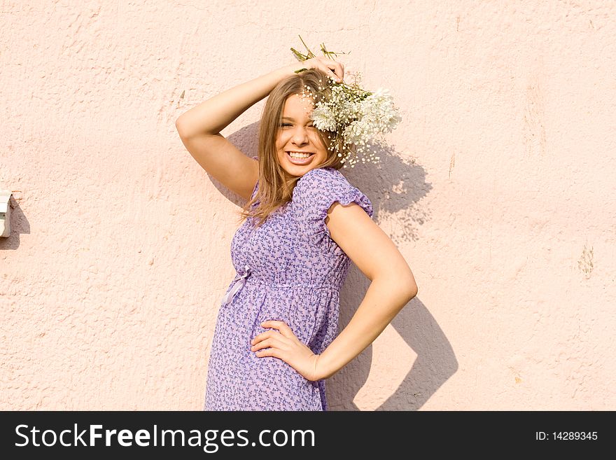 Girl with flowers standing outdoor