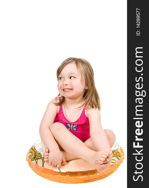 Sweet happy little girl on the beach isolated