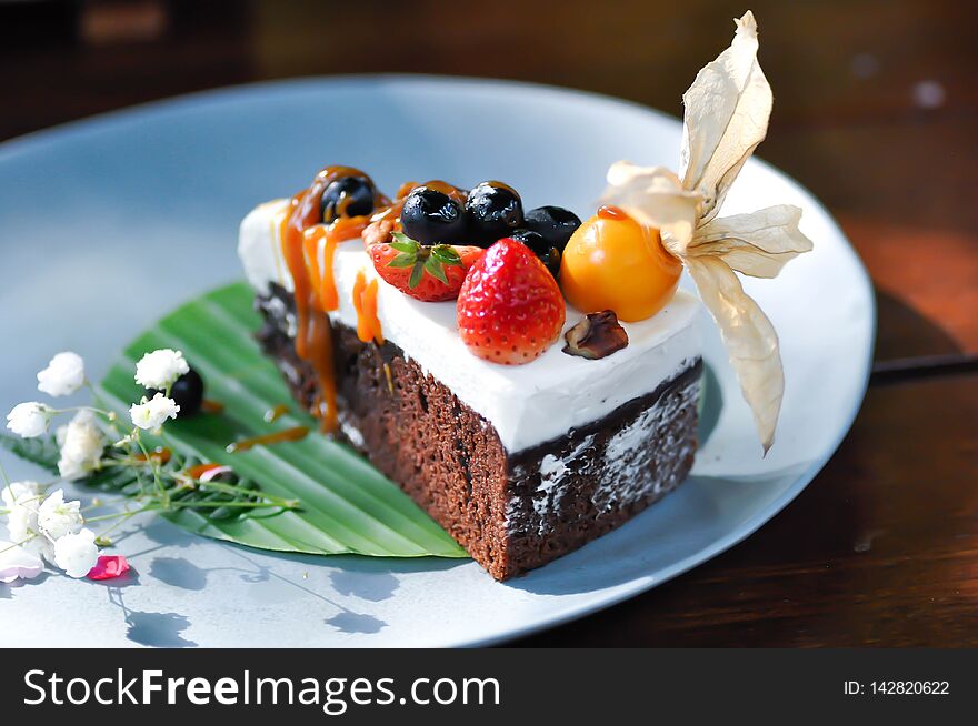 Fruit cake ,chocolate cake with fruit topping