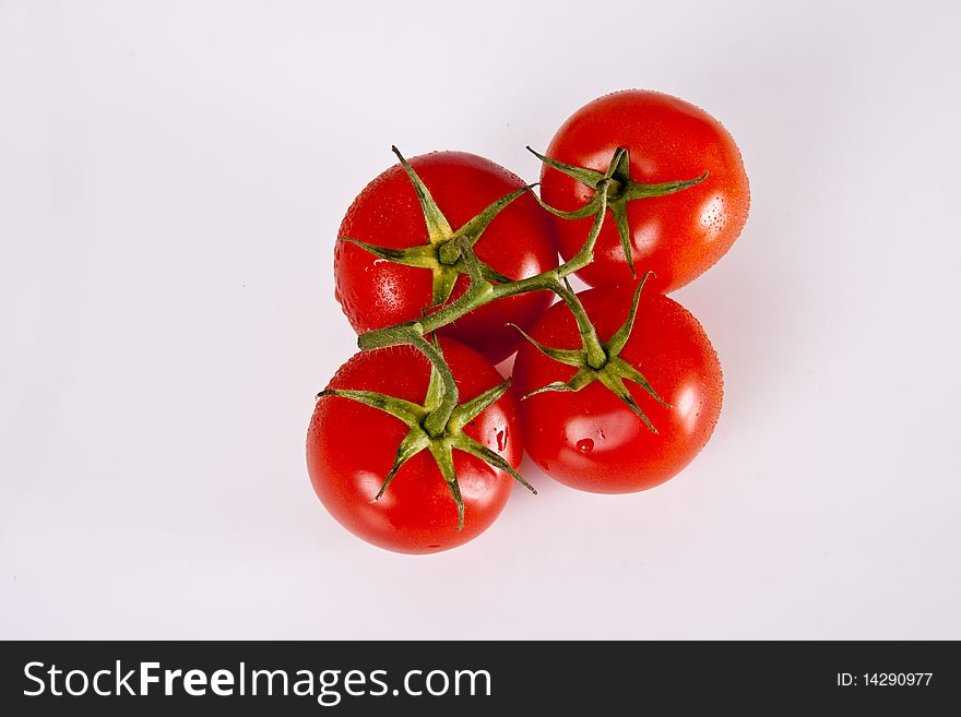 Tomatoes viewed from top on the white background