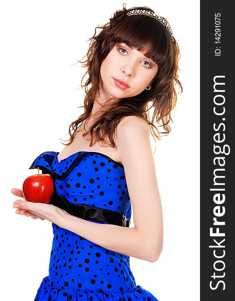 Lovely girl in a bue dress and brilliant diadem with a red apple. Lovely girl in a bue dress and brilliant diadem with a red apple