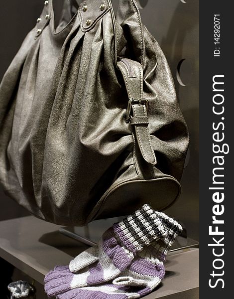 Designers handbag and matching woolen mittens