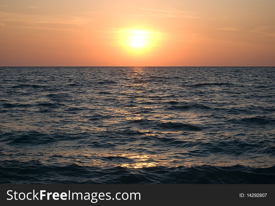 Sun goes down in the waters of the Black sea at the Western Crimea. Sun goes down in the waters of the Black sea at the Western Crimea