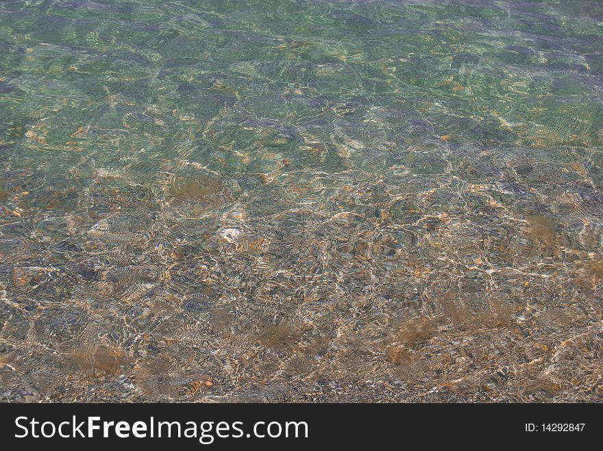 Sand bottom and clear sea water