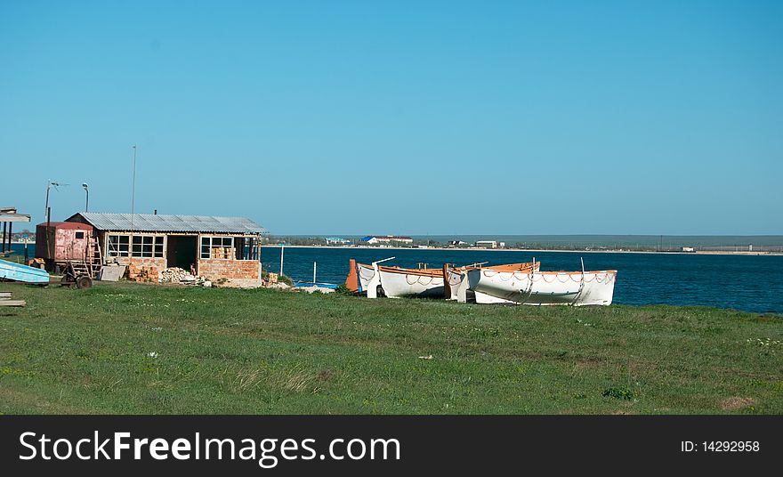 Boats on grass at the station. Boats on grass at the station