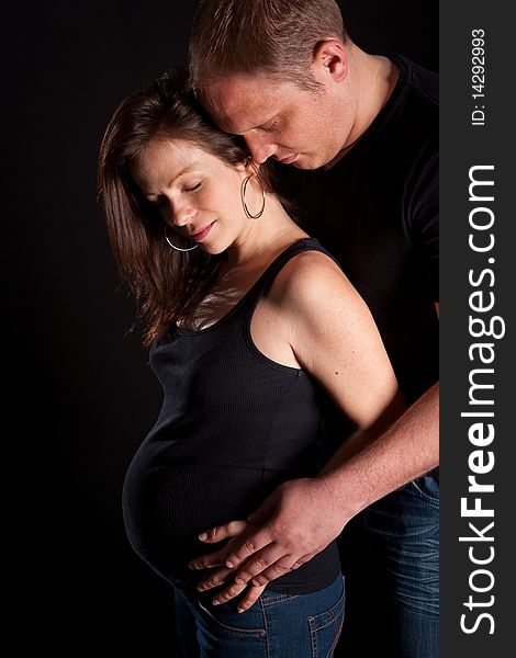 Young Couple With Pregnant Wife