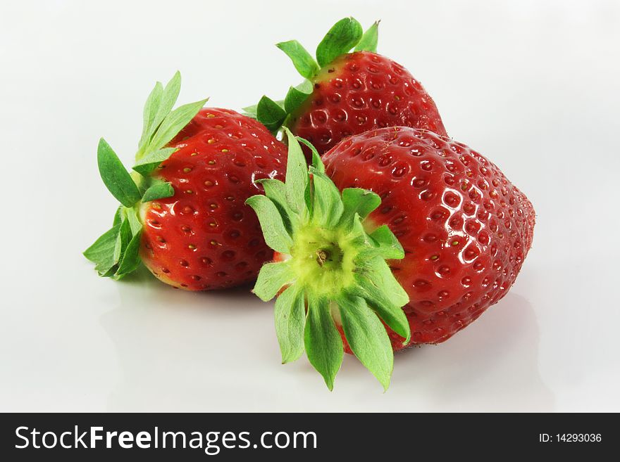 Three strawberry on white background
