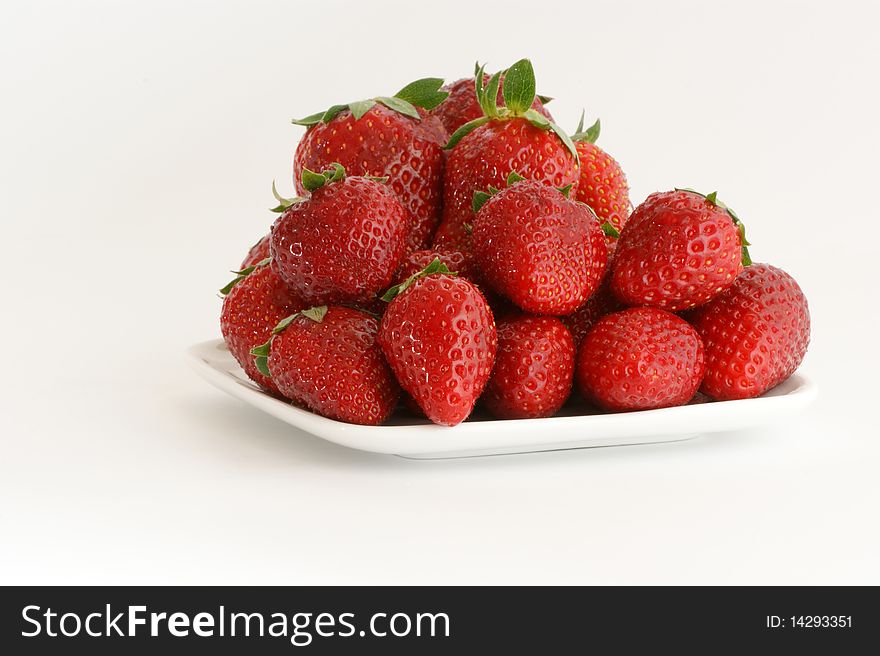 Most natural red strawberries, still life, isolated over white background