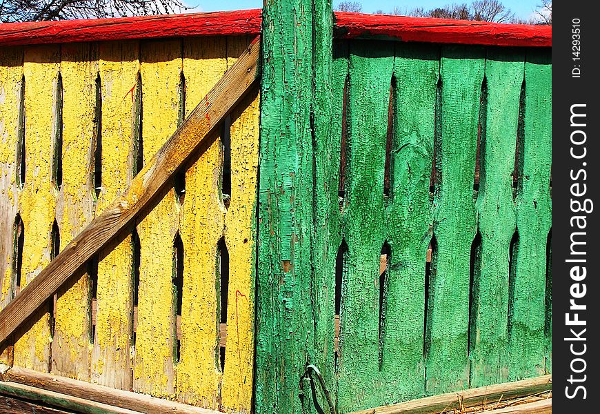 A colorful Russian fence in drab Siberia. A colorful Russian fence in drab Siberia