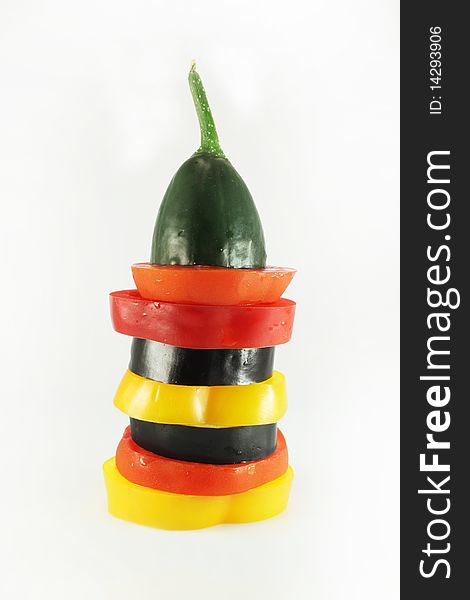 Vegetable pyramid on white background